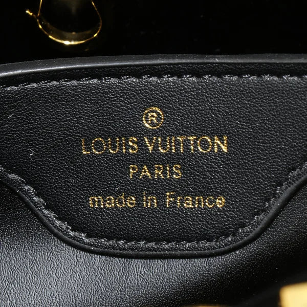 Louis Vuitton Bag is Made of Genuine Leather and Decorated with Diamonds
