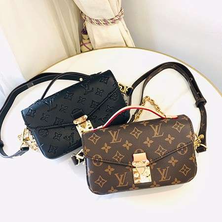 Louis Vuitton Crossbody Bag with a Side Slot for Storing Cards.