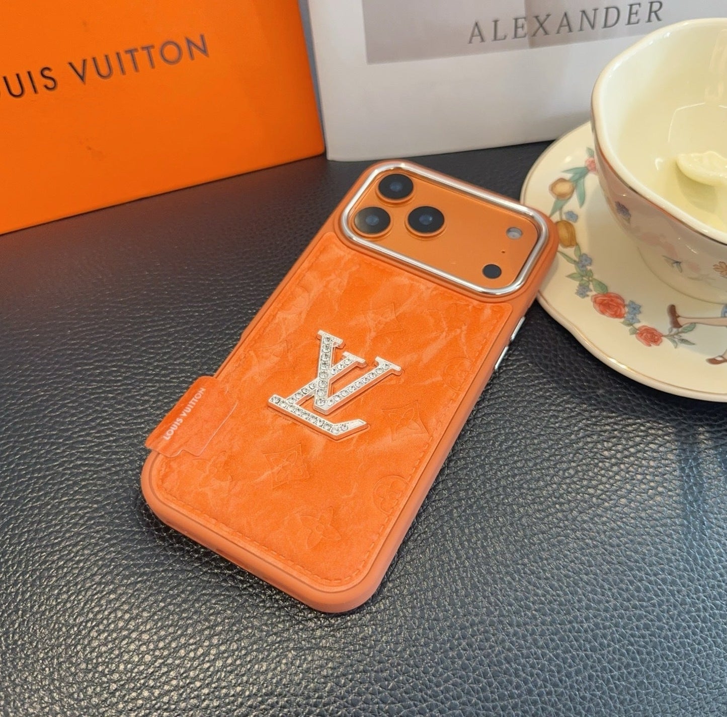 Premium Monogram Embossed Orange – Crystal Logo Edition